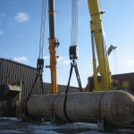 Crane Lifting Up Tank