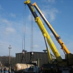 Crane Lifting Up Tank