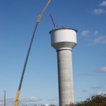 Crane Working on Water Tower