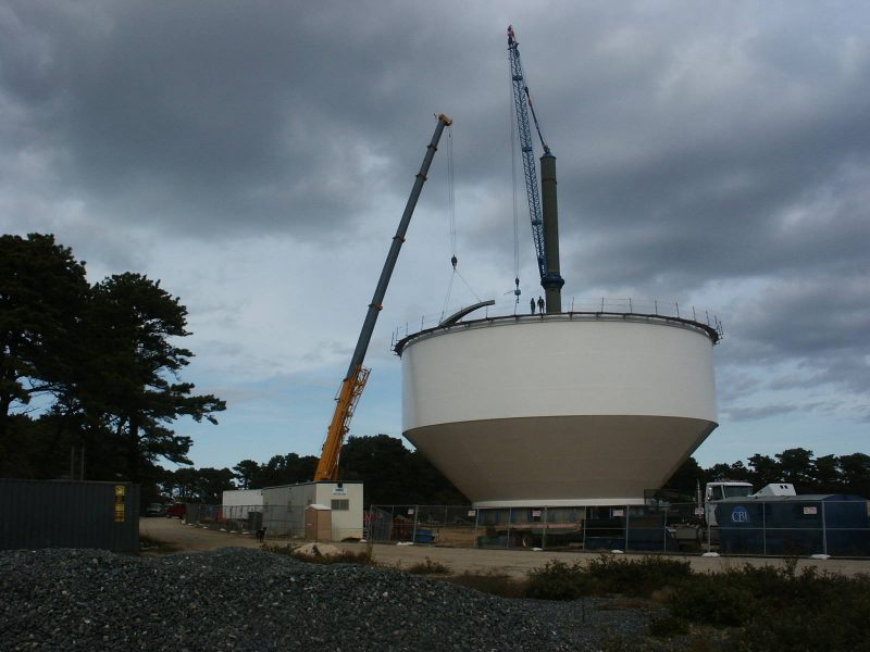 Cranes Working on Water Tower