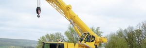 Hydraulic crane on construction site