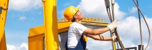 Crane operator adjusting lift