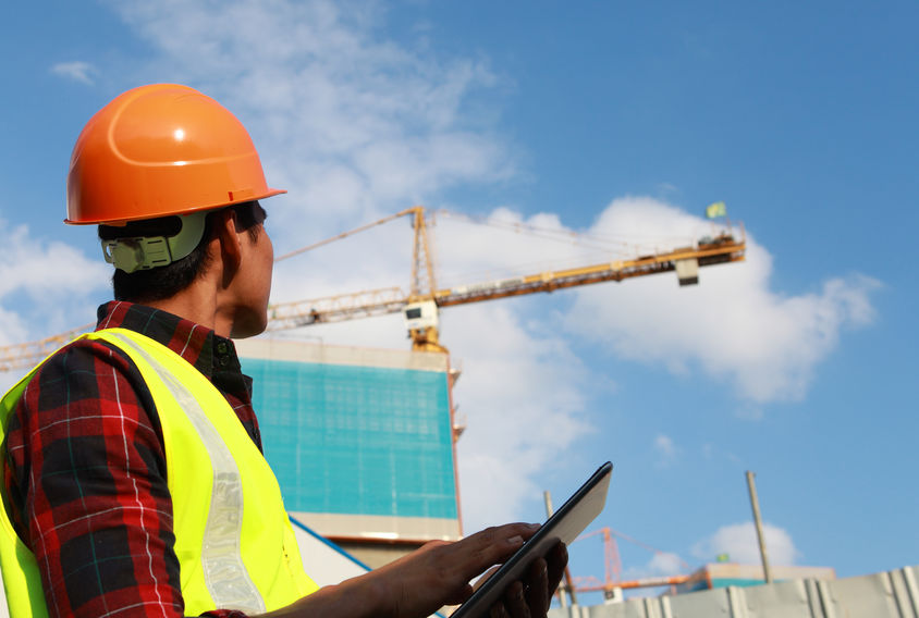 construction crane operator going over checklist 
