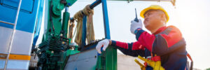Crane operator supervising at construction site